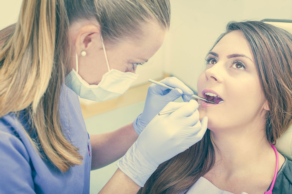 Symptoms, causes, and treatments of cavities